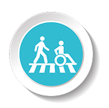 A circular icon featuring a blue background with a graphic of a person walking and a person in a wheelchair crossing over a set of white railway tracks.