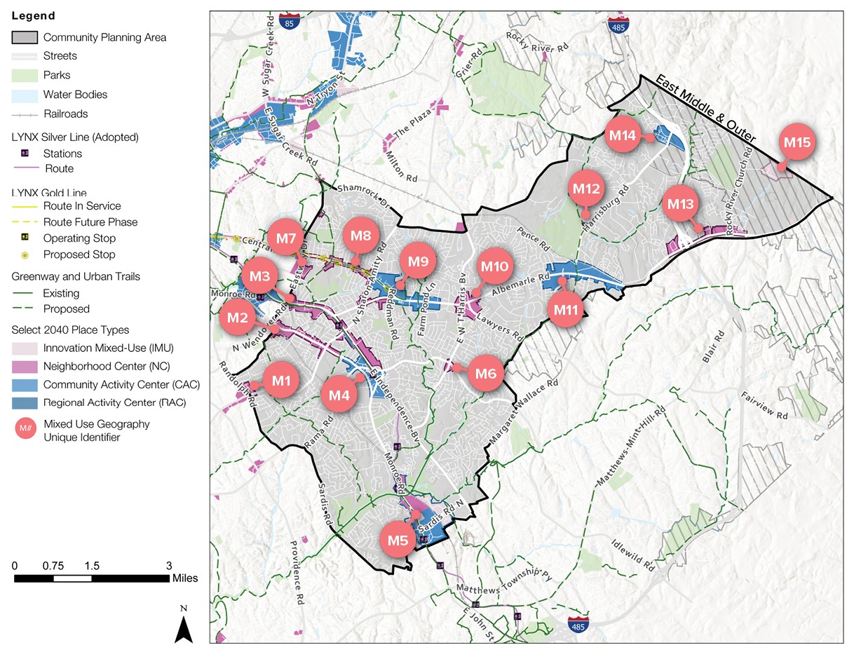 A map depicting a community planning area featuring streets, parks, water bodies, and a light rail line. Various areas indicated with labels M1 to M15, highlighting specific zones and proposed transit routes.